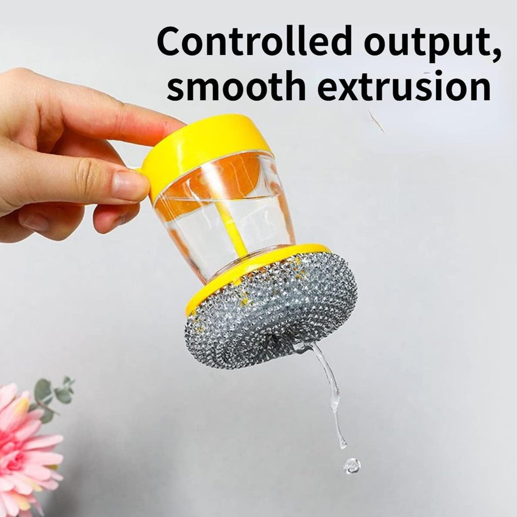The soap dispenser with scrub being used to clean a glass bowl, demonstrating its gentle effectiveness.