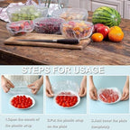 Elastic food covers protecting dishes from insects at an outdoor picnic setting.