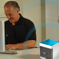 Mini Portable Air Cooler providing a refreshing breeze.