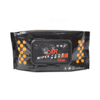 Hand using a Car Cleaning Wipe to clean a vehicle's console