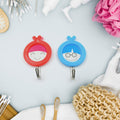 Set of two heavy-duty self-adhesive hooks, ideal for bathroom and kitchen organization.