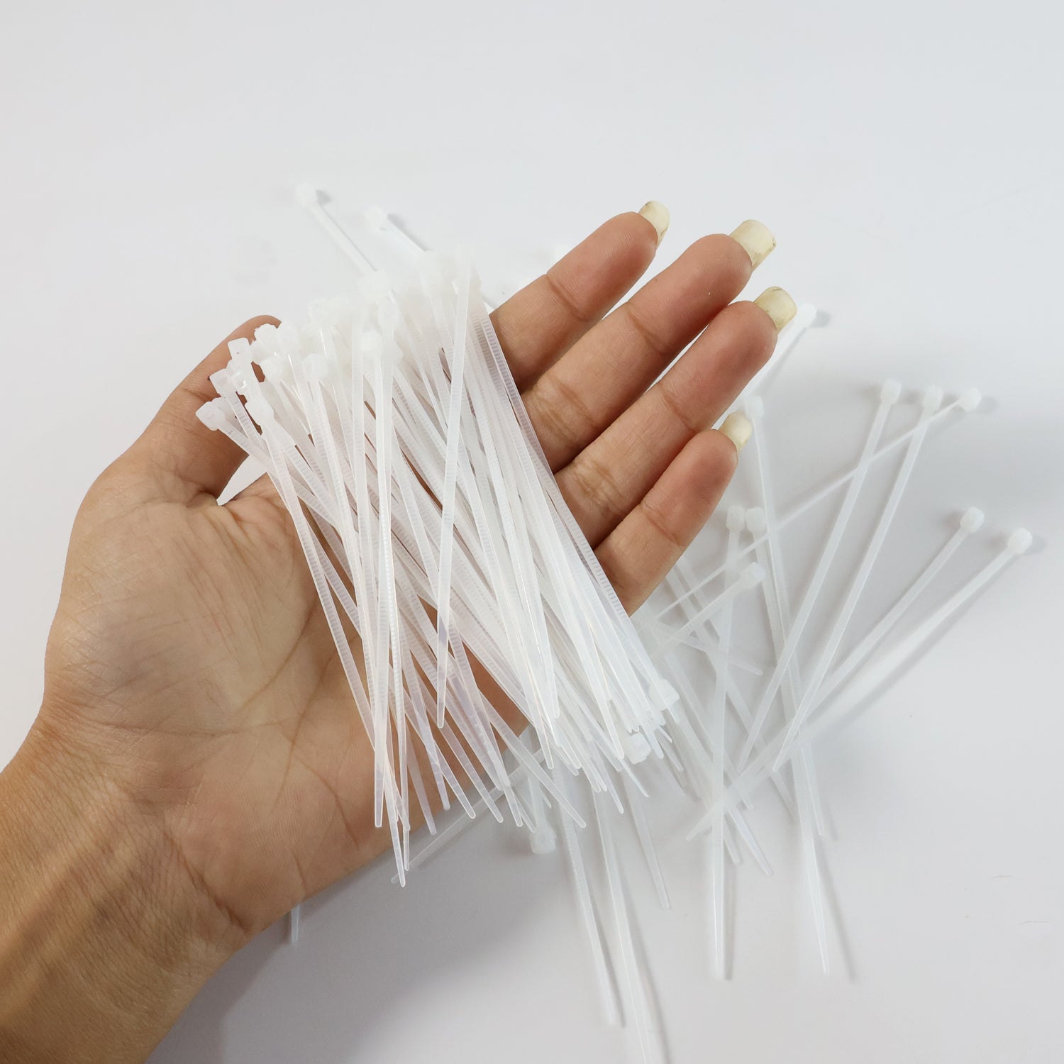 Nylon zip ties effectively bundling and organizing various electrical cords.