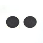 Various sizes of brown felt furniture pads laid out for floor scratch prevention.
