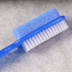 Foot scrubber brush being used in shower for daily foot care