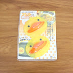 Front view of duck shape silicone hot pot holder providing heat protection