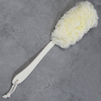 The loofah back scrubber positioned for an effective shower routine.