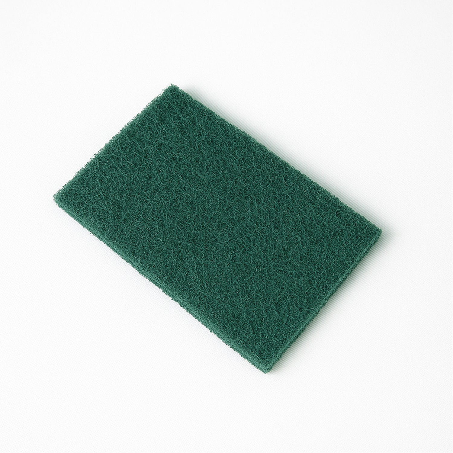 Kitchen cleaner pad effectively removing stains from surfaces