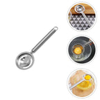 Stainless steel egg separator with a handle, ready to filter egg yolks and whites.