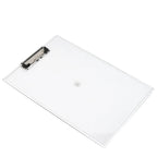Student using a transparent exam pad for writing during an exam.