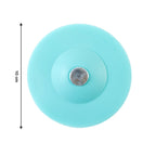 Soft silicone drain protector placed on floor shower drain