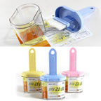 Side view of the durable plastic spatula, perfect for heatproof cooking.