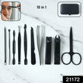 Nail care tools including scissors, nail file, and tweezers for manicure grooming
