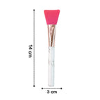 Silicone face mask brush angled view showing head and handle
