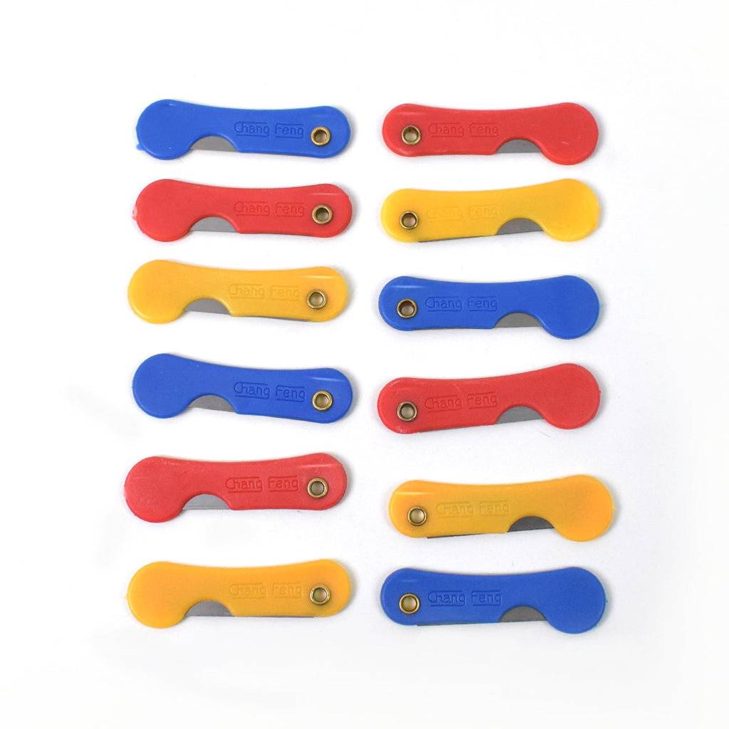 Smart design details of a portable mini paper cutter knife with a hanging hole.