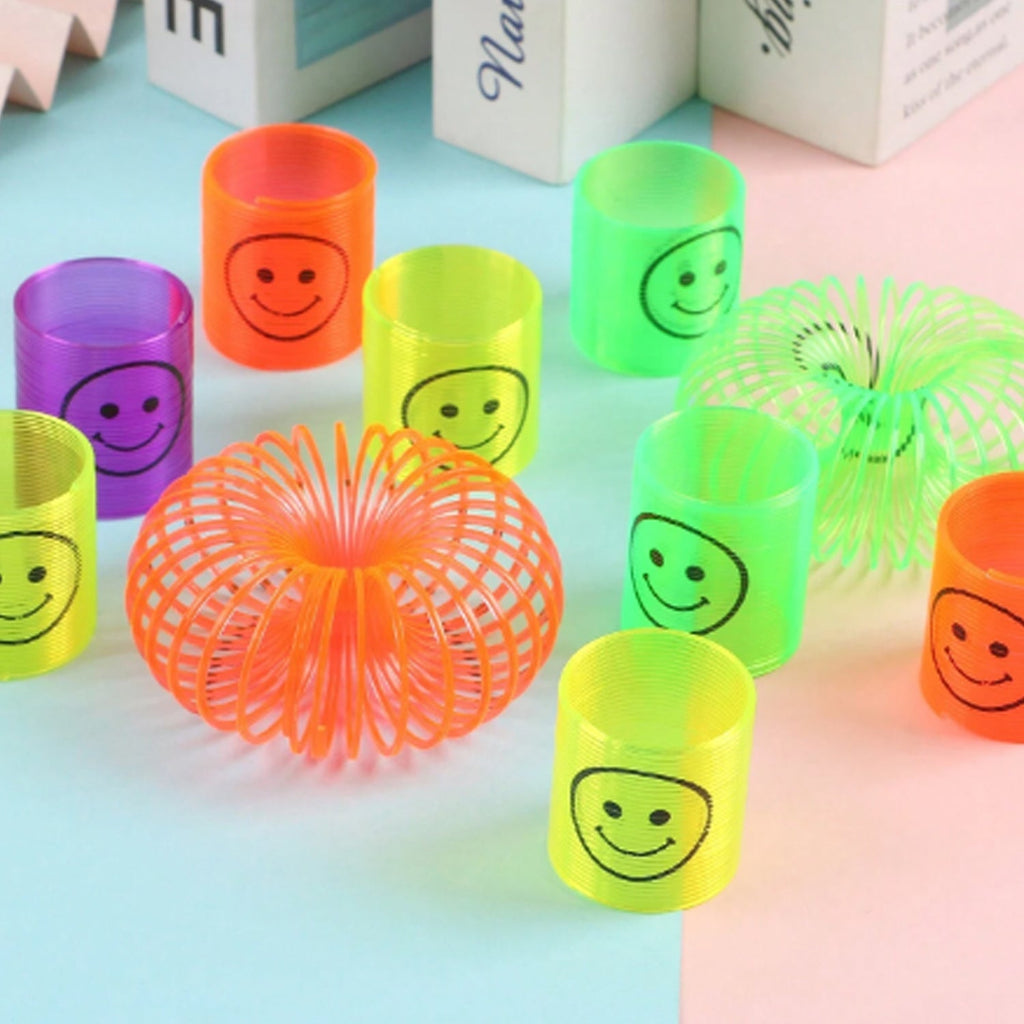 A complete set of 12 multicolor slinky spring toys, ready for fun.