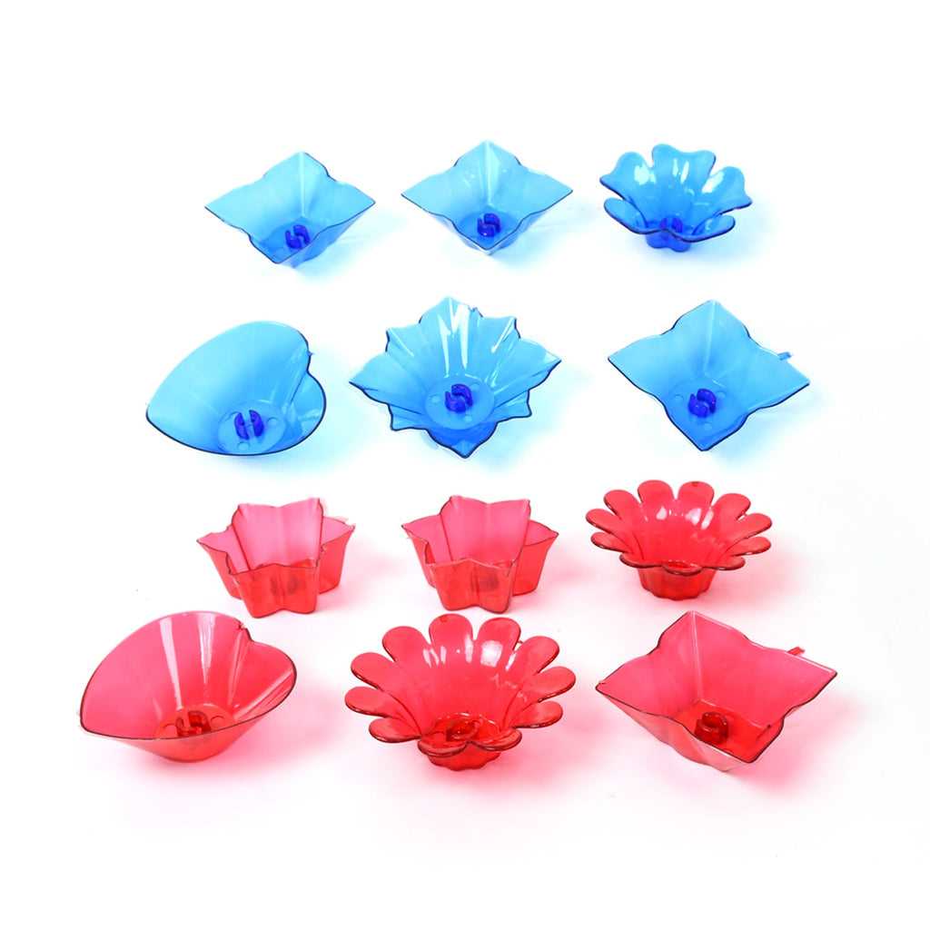 Assorted multi-shape plastic diyas creating a shimmering glow for festive decor.