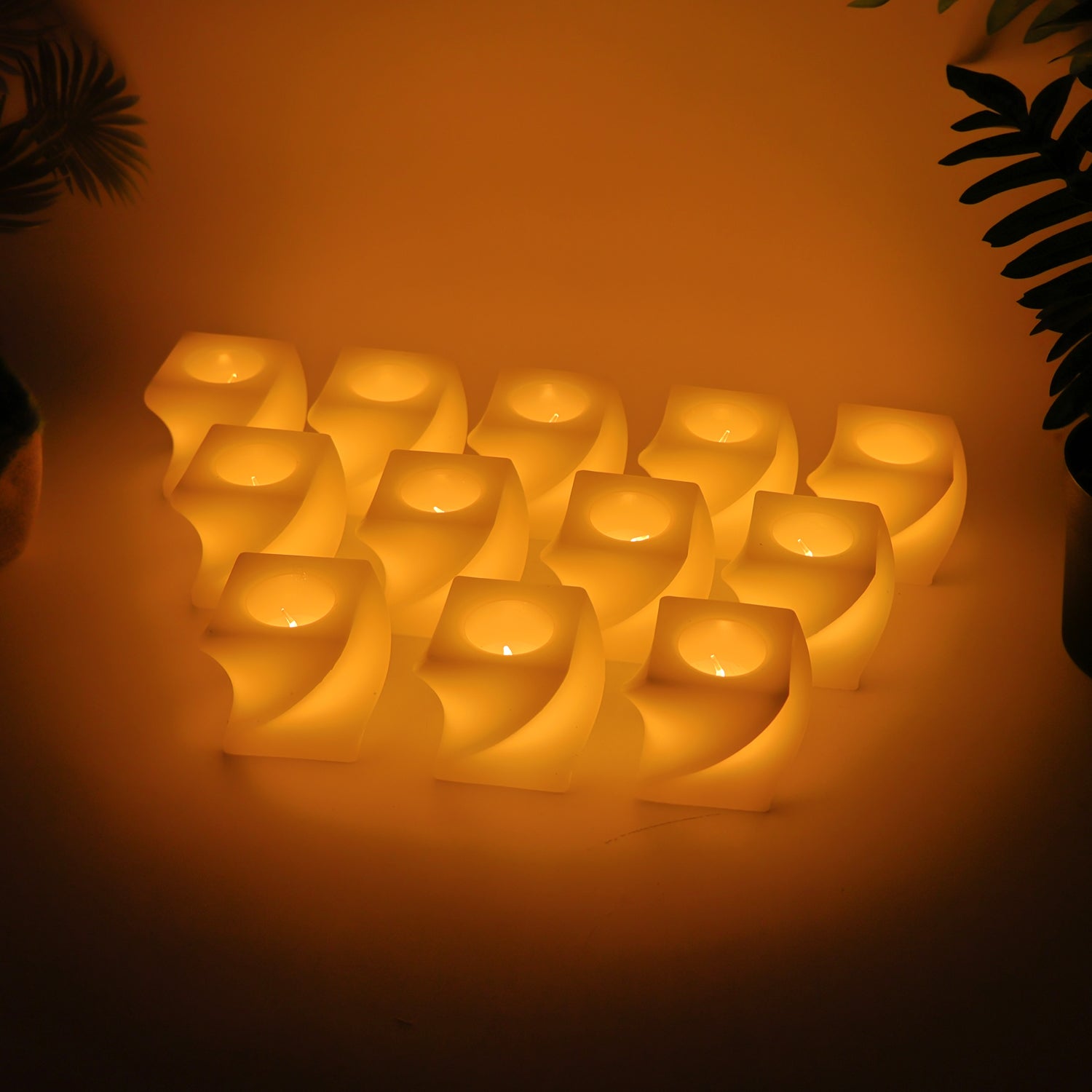 Decorative LED candles emitting warm white flickering light for cozy settings