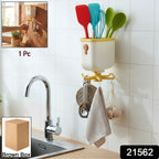 Sticky wall hook holding a kitchen towel for convenient storage