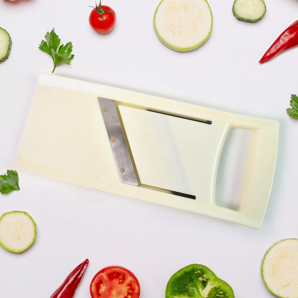Top-down view of the fruit slicer kitchen tool showcasing its ergonomic design.