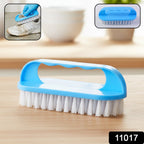Durable heavy-duty cleaning brush scrubbing kitchen sink grime effectively.