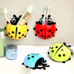 A vibrant Ladybug toothbrush holder accentuating a modern bathroom setting.