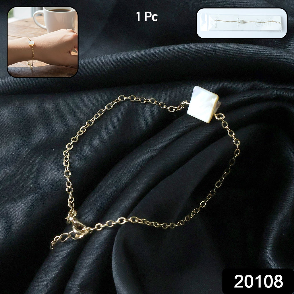 Adjustable chain bracelet worn on wrist showcasing minimalist square stone charm