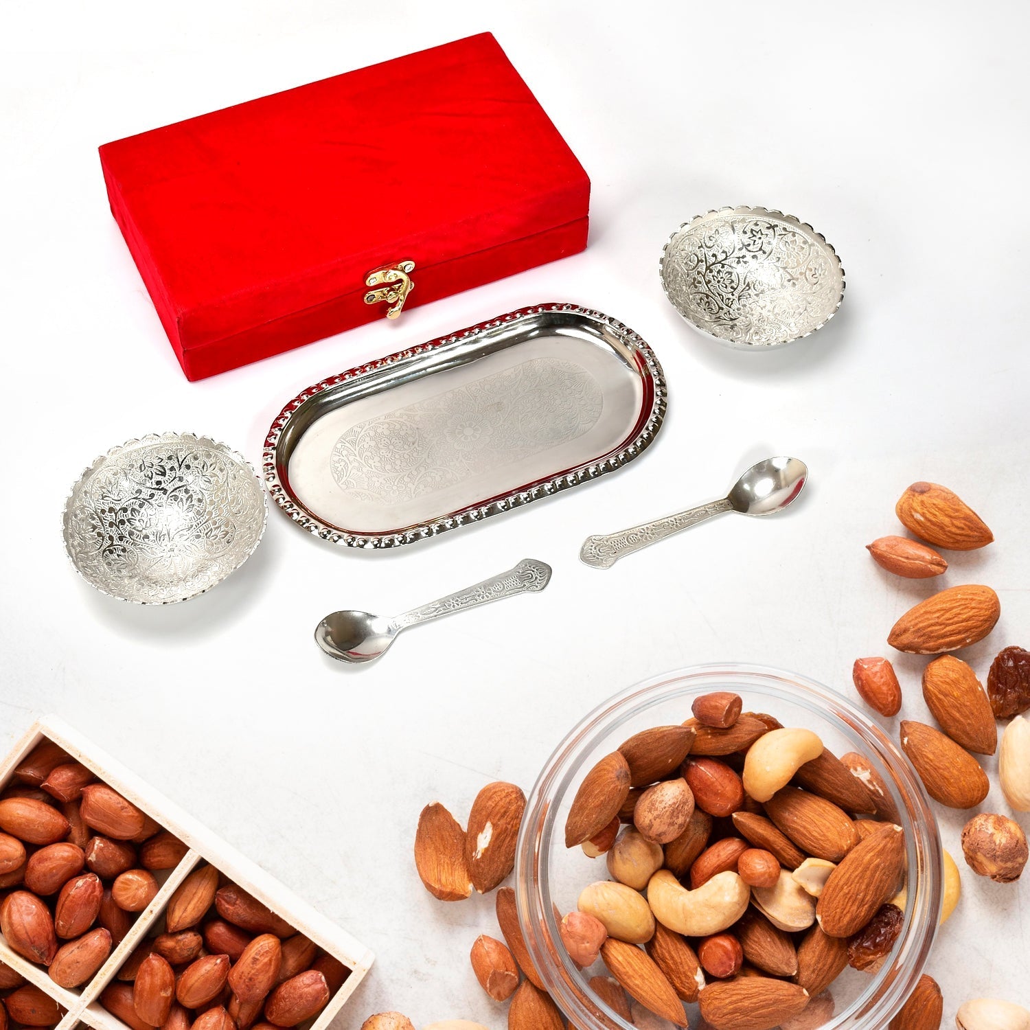 This versatile silver plated brass tray set is perfect for serving dry fruits, sweets, or small appetizers.