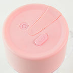 Detail of the sharp stainless steel multi-blades inside the portable juicer.