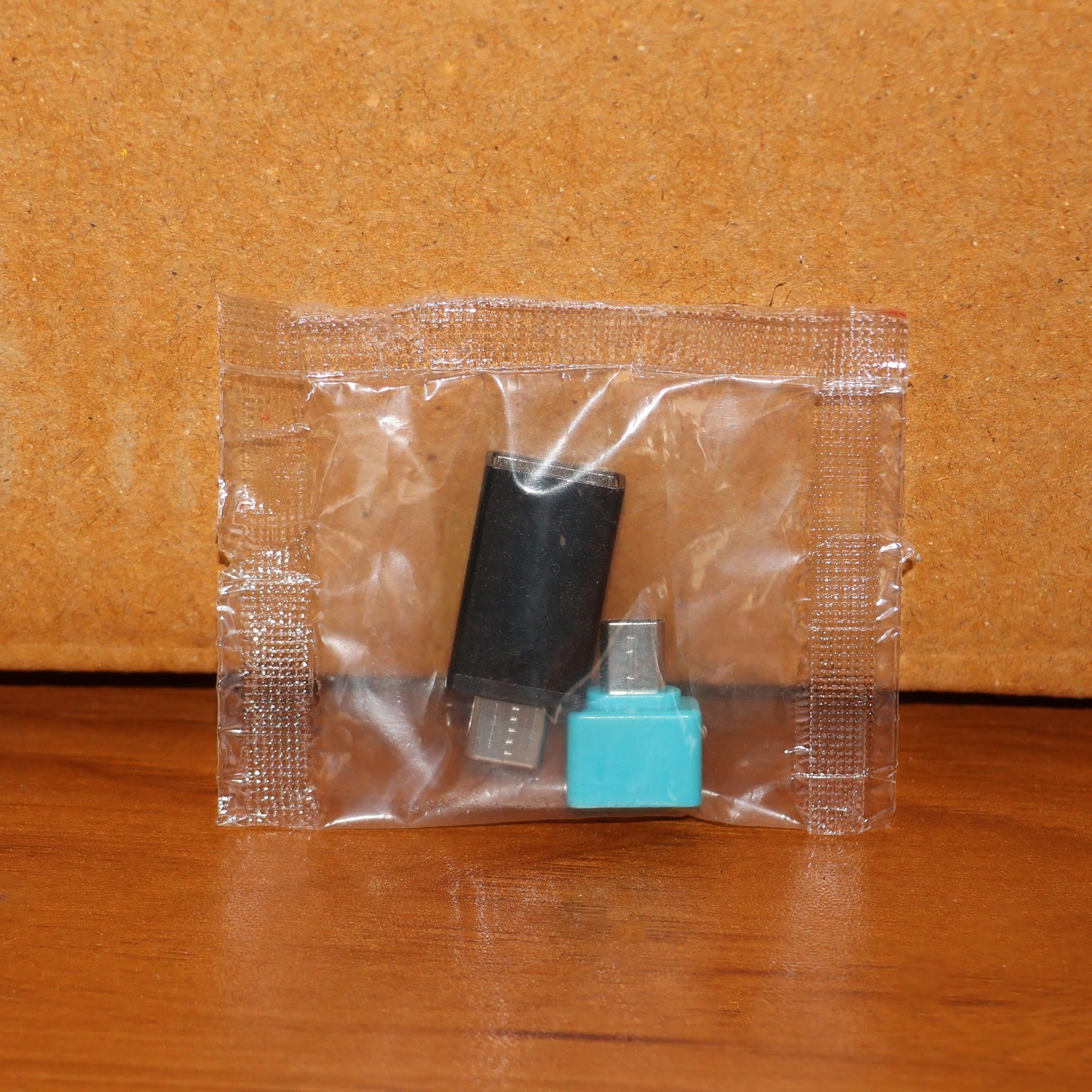 USB OTG adapter set with both Type-C and Micro USB adapters displayed in their packaging.