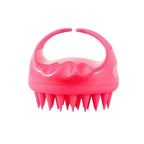 Detailed view of flexible silicone bristles on the Scalp Massager Comb.