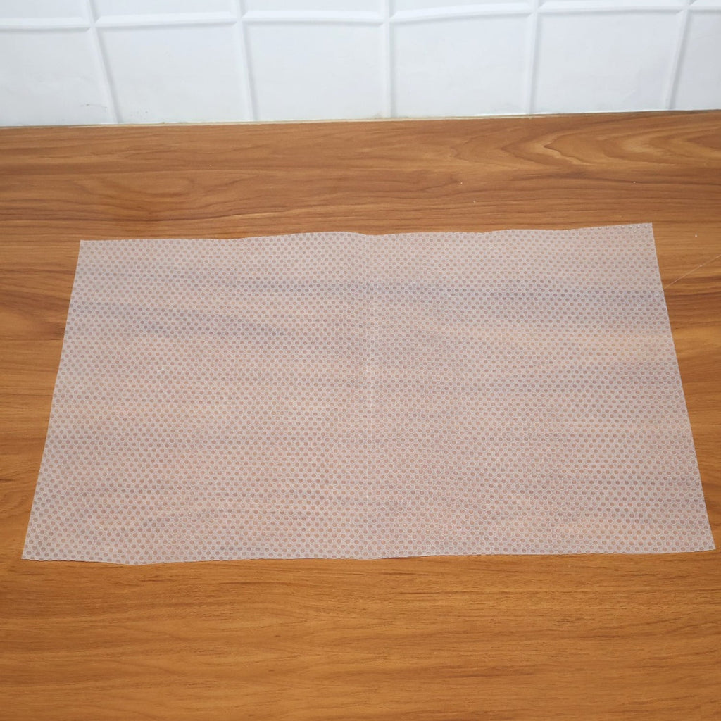 Close-up shot showing the textured surface of the refrigerator mat