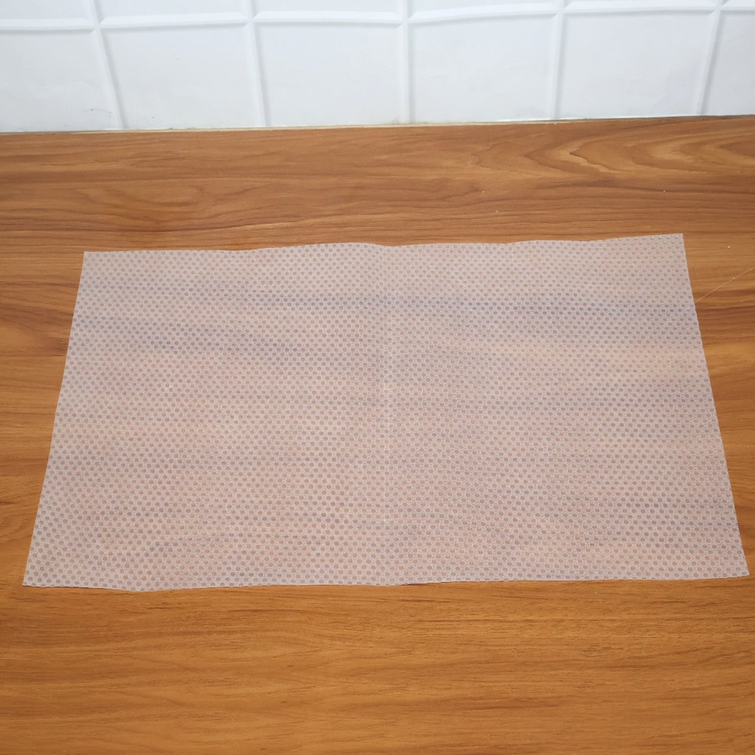 Close-up shot showing the textured surface of the refrigerator mat
