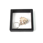 Mini nail clipper keychain in clear showcase with 3D floating effect