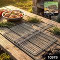 Heavy-duty stainless steel barbecue grill basket with long handle for outdoor grilling