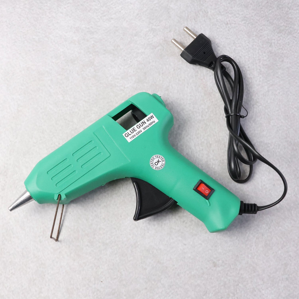 Side view of the 40 Watt Hot Melt Glue Gun, highlighting its precision nozzle.