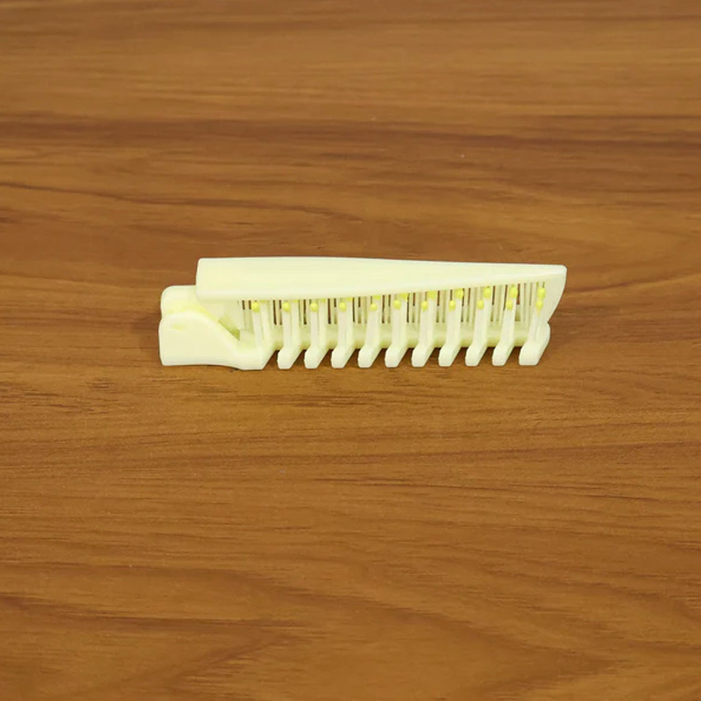 Open foldable hair comb & brush ready for styling