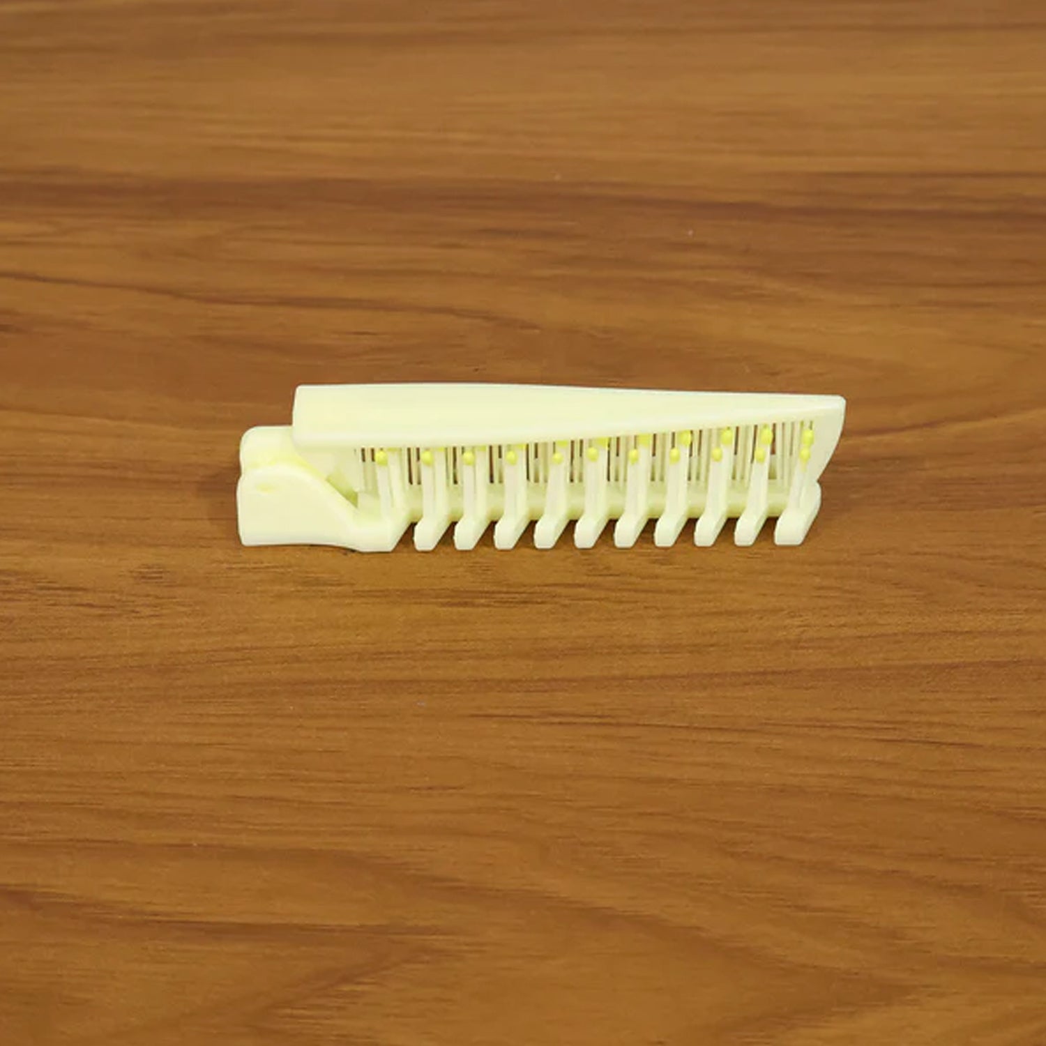 Open foldable hair comb & brush ready for styling