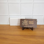 Open Hanuman Chalisa wooden panels displayed on stand for easy reading