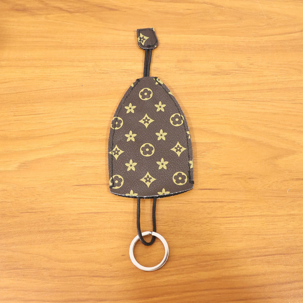 Multipurpose keyholder with strap designed for easy carry and access