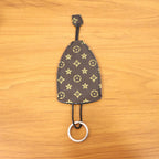 Multipurpose keyholder with strap designed for easy carry and access
