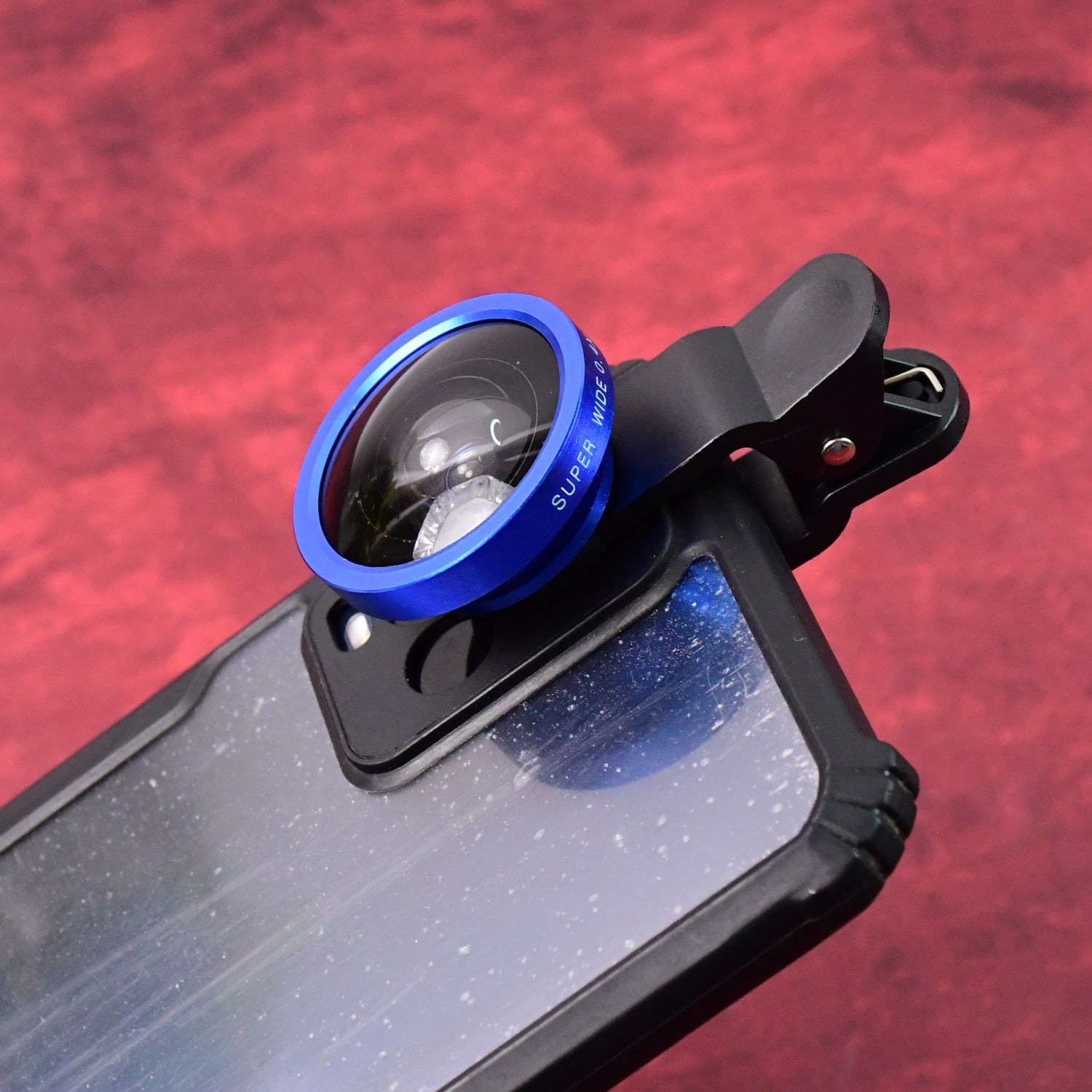 Closeup of wide-angle selfie lens with protective cover attached