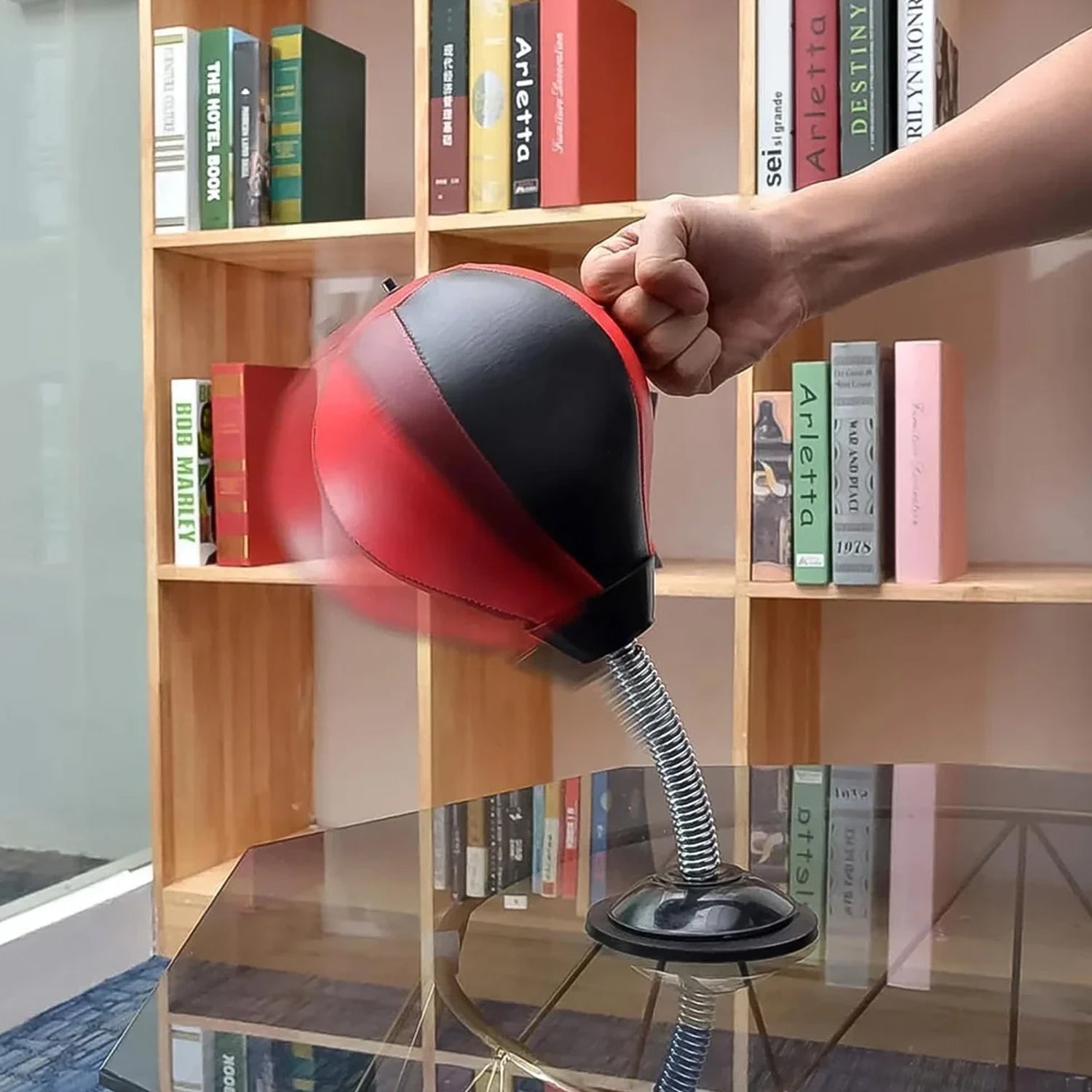 Speed ball punching bag with suction cup base for reflex training