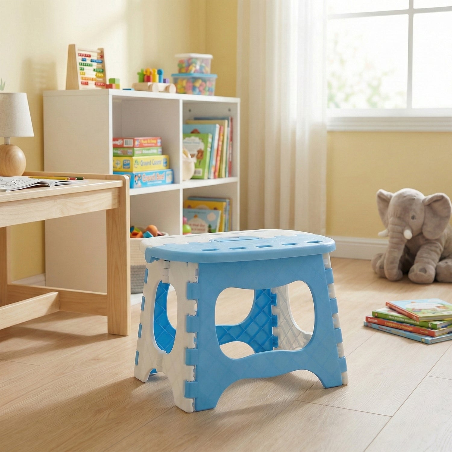 Child using foldable step stool at bathroom sink for easy reach