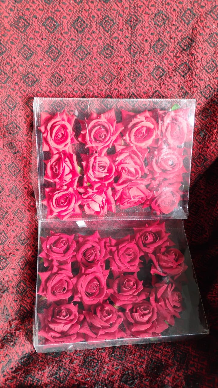 Packaging of the 12-piece velvet rose hair clip set, ensuring safe delivery.