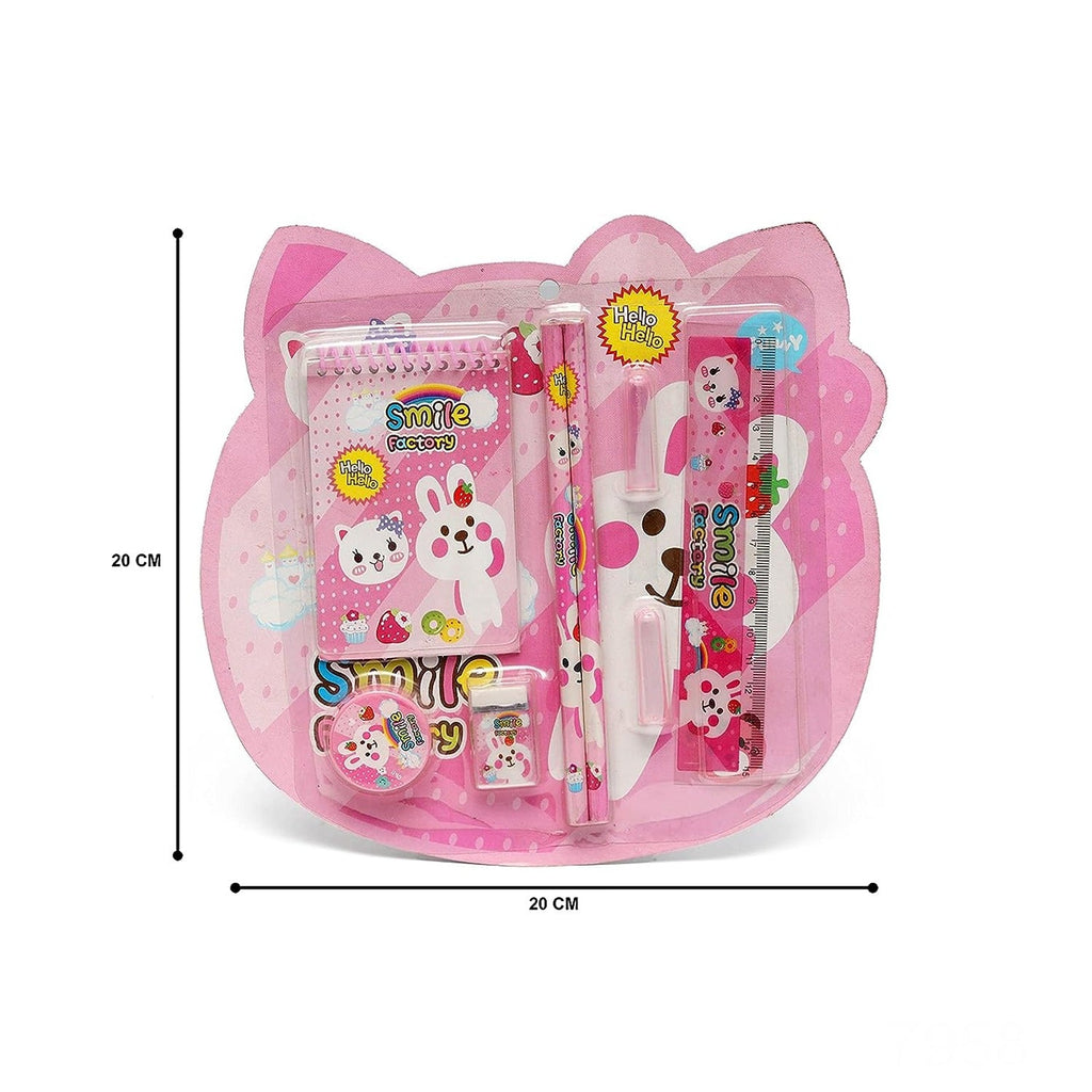 Detailed shot of various stationery items, including a sharpener and pencil cover, from the kids' gift set.