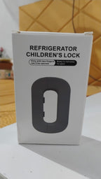 Fridge safety lock device to prevent toddlers from opening the freezer door