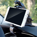 PHOBIA leopard car phone holder securely gripping a smartphone on a car dashboard.