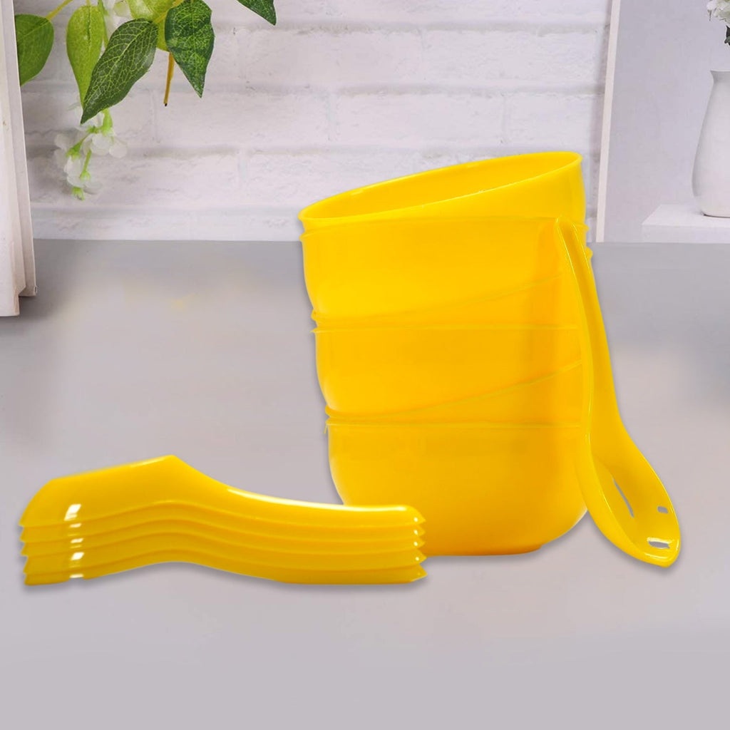 The CookAura 6-piece plastic soup bowl and spoon set neatly stacked, ready for storage.