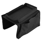 Practical sofa armrest organizer storing books, an iPad, and remote controls.