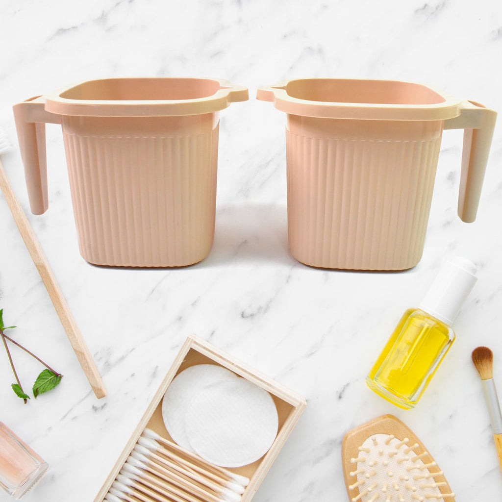 Top-down view of the square plastic bath mug, showcasing its wide opening.